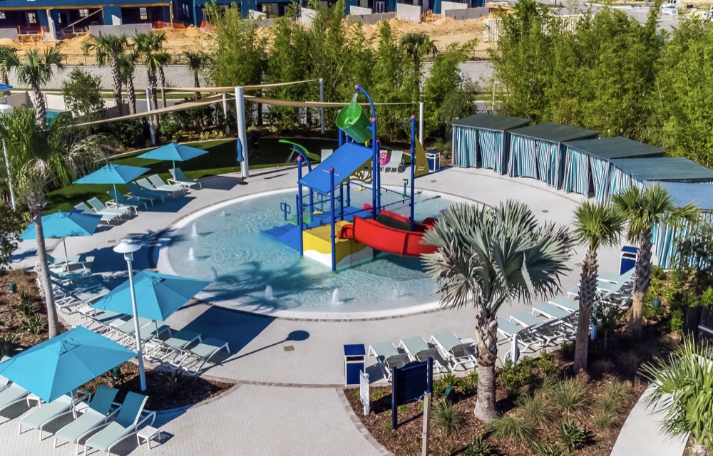 Colorful kids splash pad water play area with fountains at Windsor Island Resort